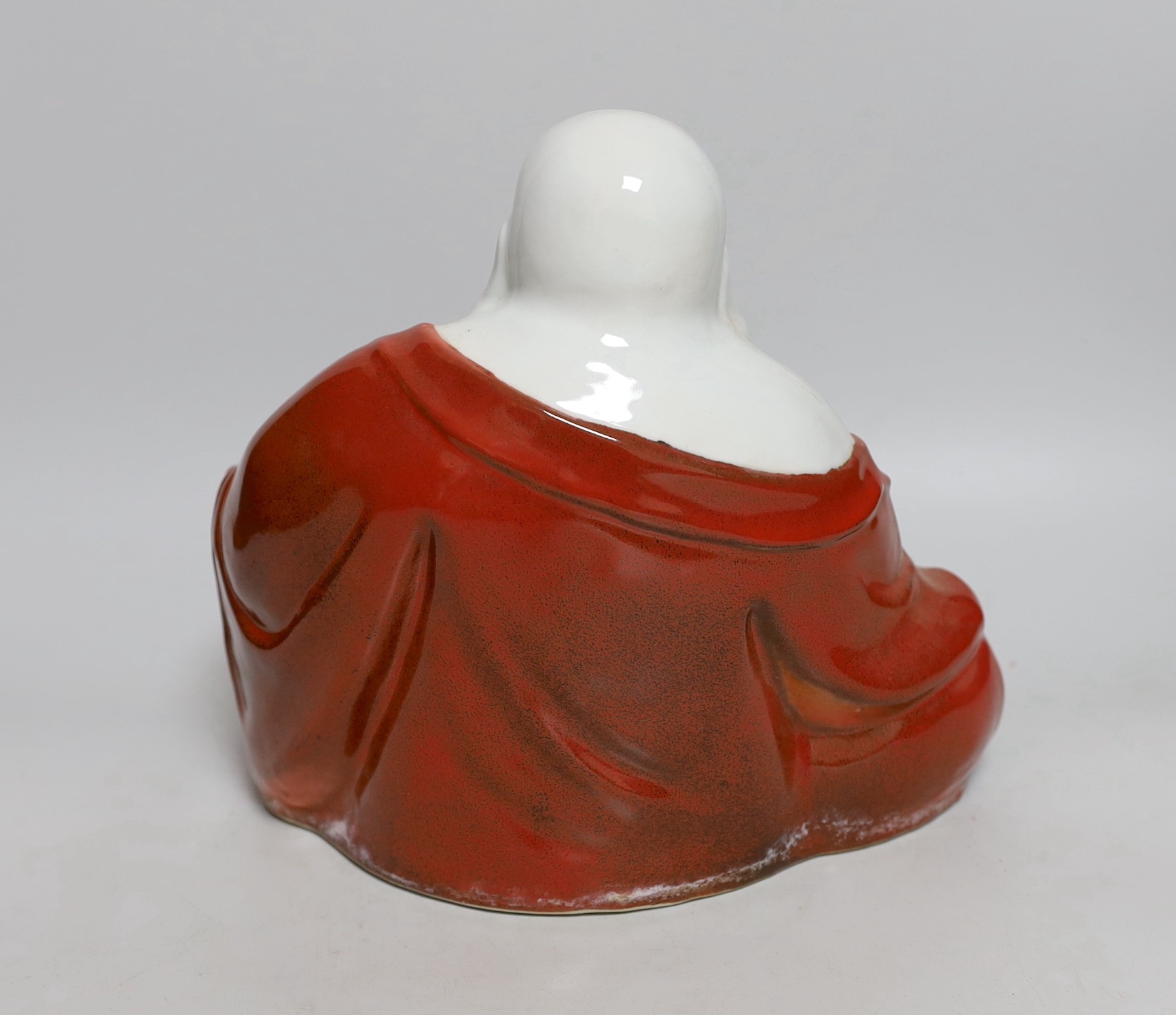 A Chinese enamelled porcelain figure of Budai, Republic period, 24cms high